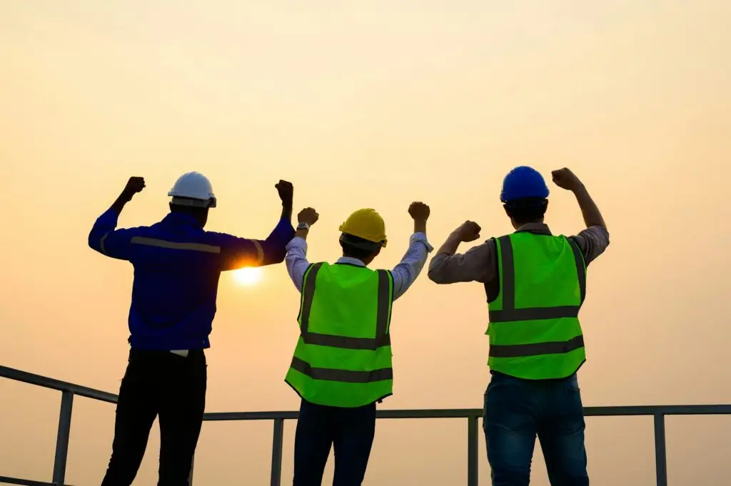 Engineers checking solar panels on solar power plant